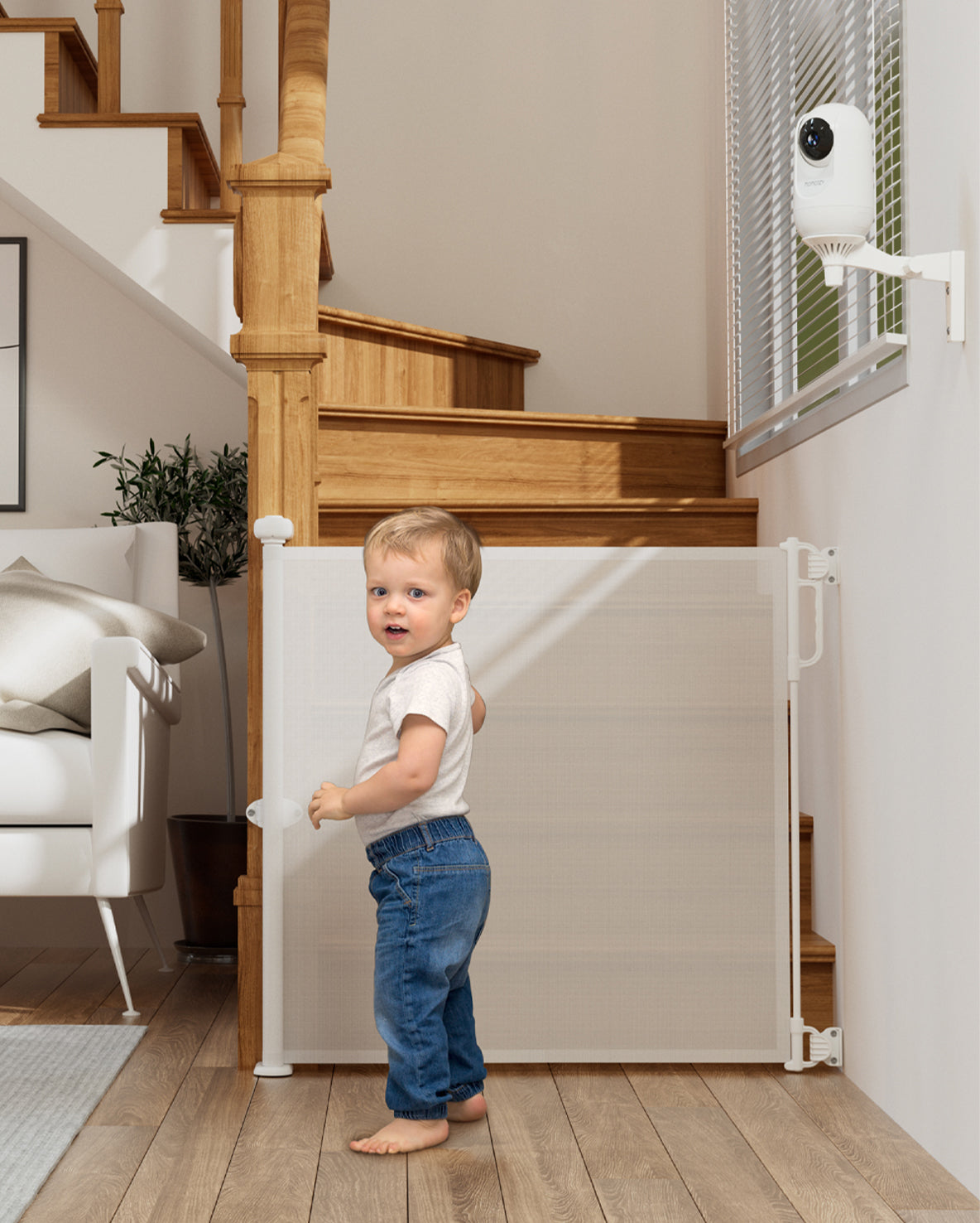 One Momcozy Baby Monitor and One Retractable Baby Gate